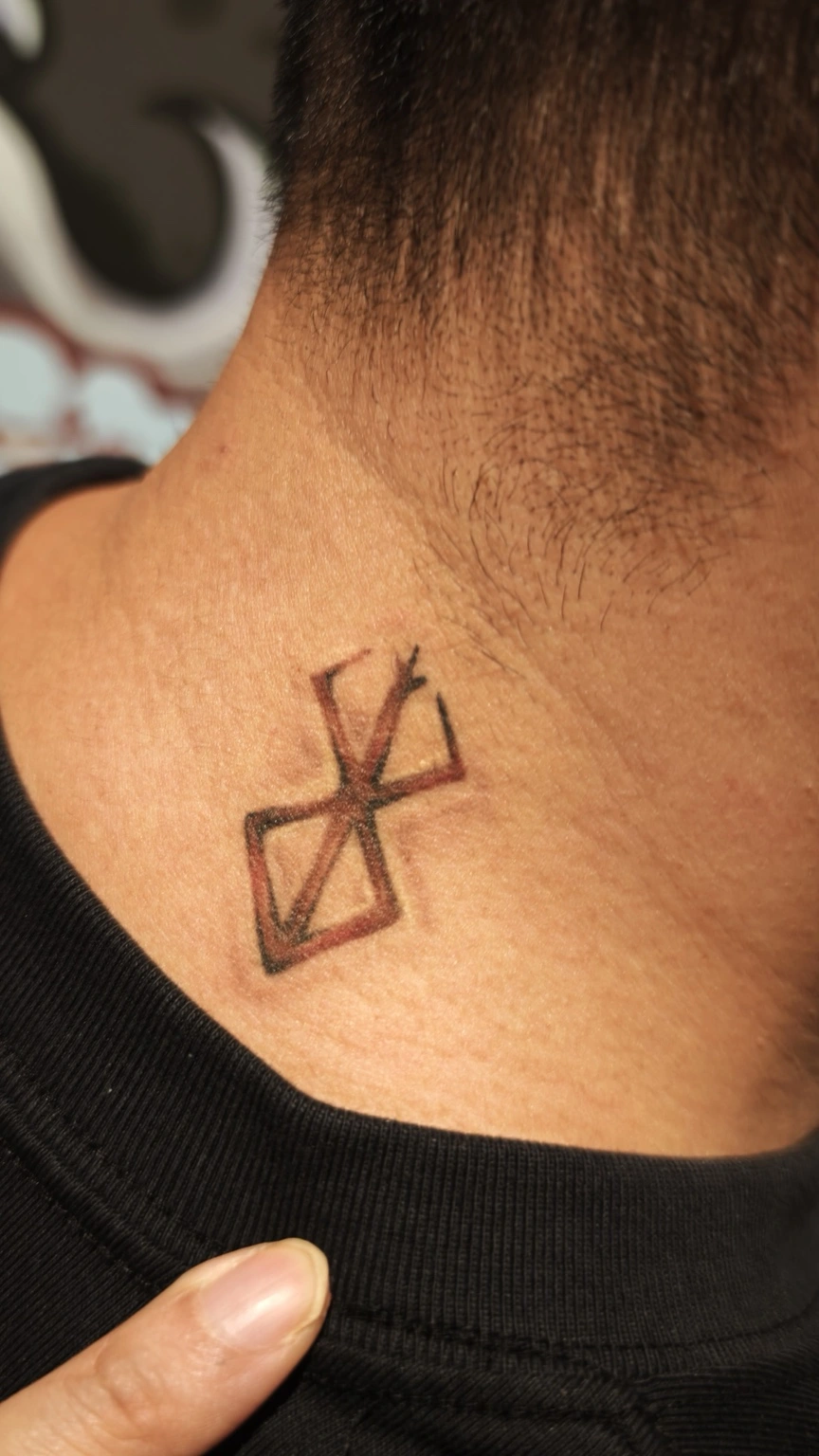Berserk Brand of Sacrifice — healed tattoo